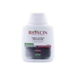 شامپو ضد ریزش سفید مخصوص موهای خشک تا نرمال بیوکسین